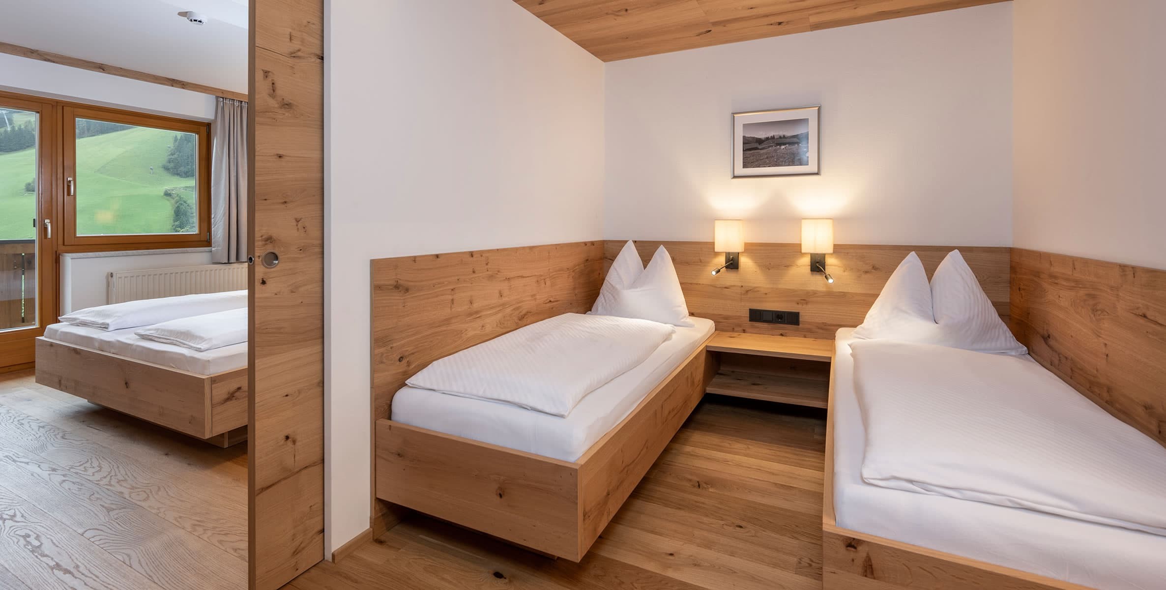 Schlafzimmer mit Einzelbetten in der Ferienwohnung